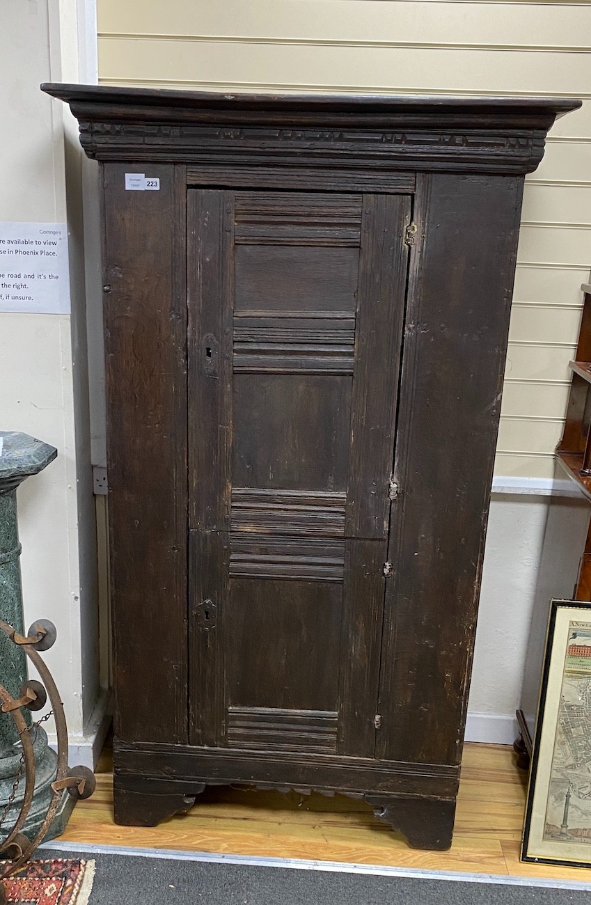 A 17th century and later oak two door cupboard, width 104cm, depth 54cm, height 177cm